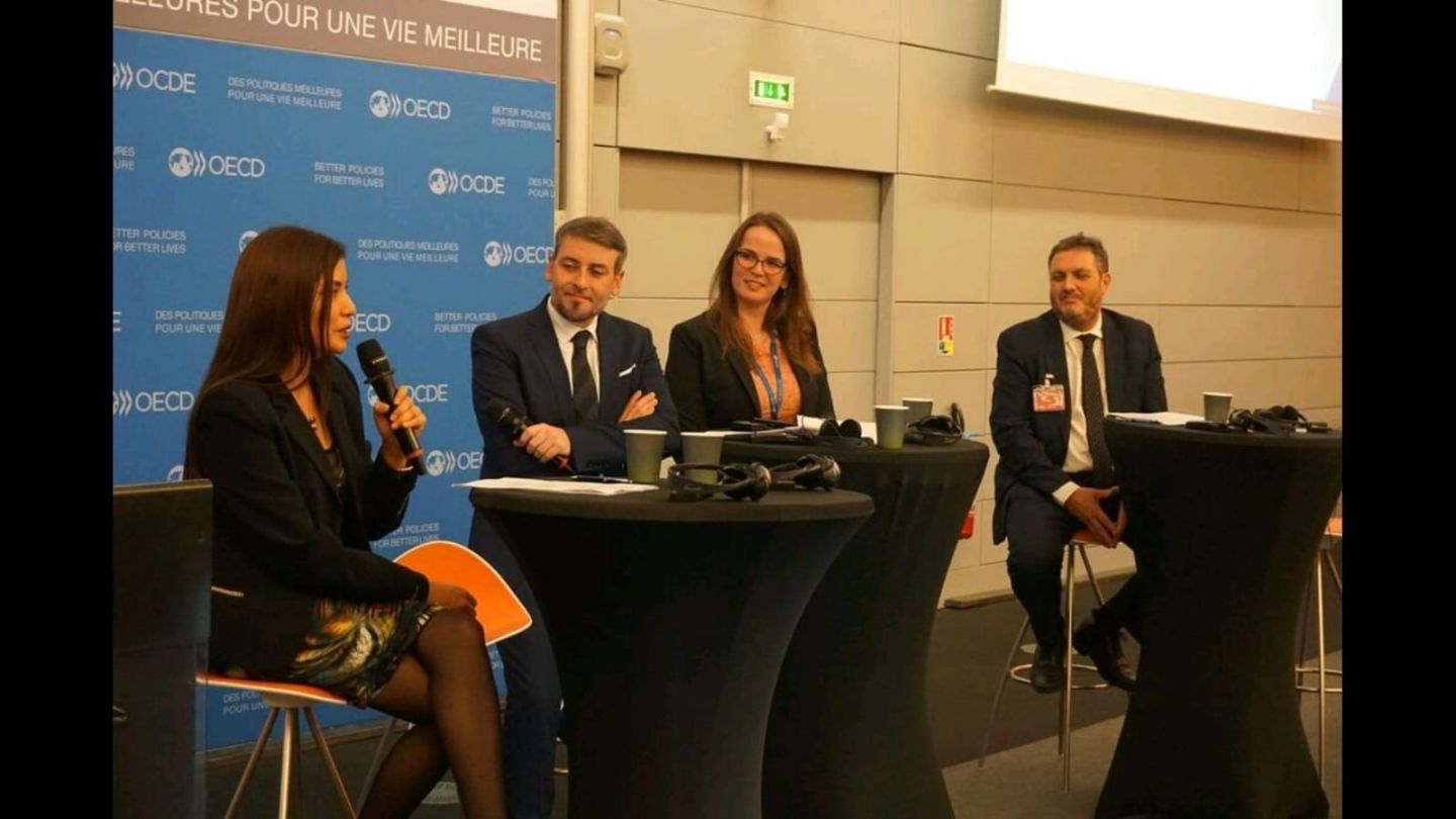 Paige Kirby, second from the right, is part of a panel at the OECD Results Workshop in December 2019